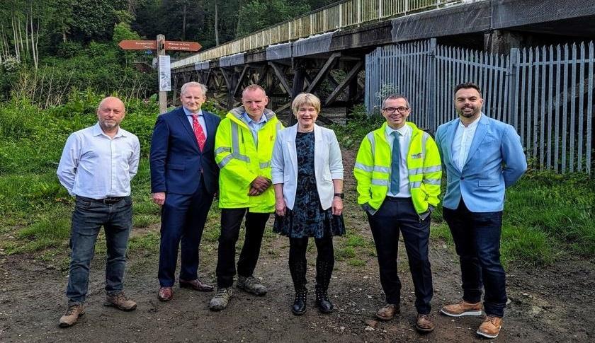 Key stakeholders next to the new Tram Bridge